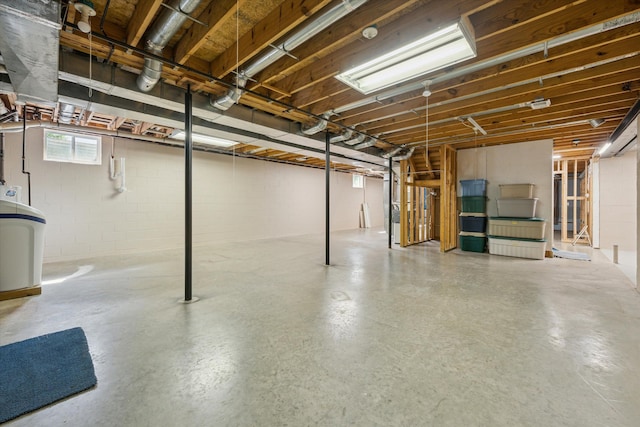 basement featuring concrete block wall