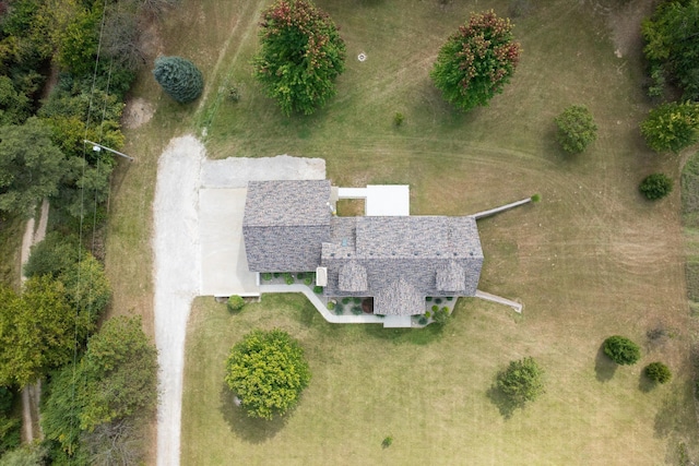 birds eye view of property with a rural view