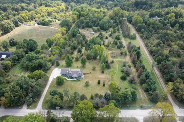 aerial view featuring a forest view