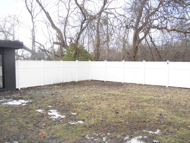 view of yard featuring fence