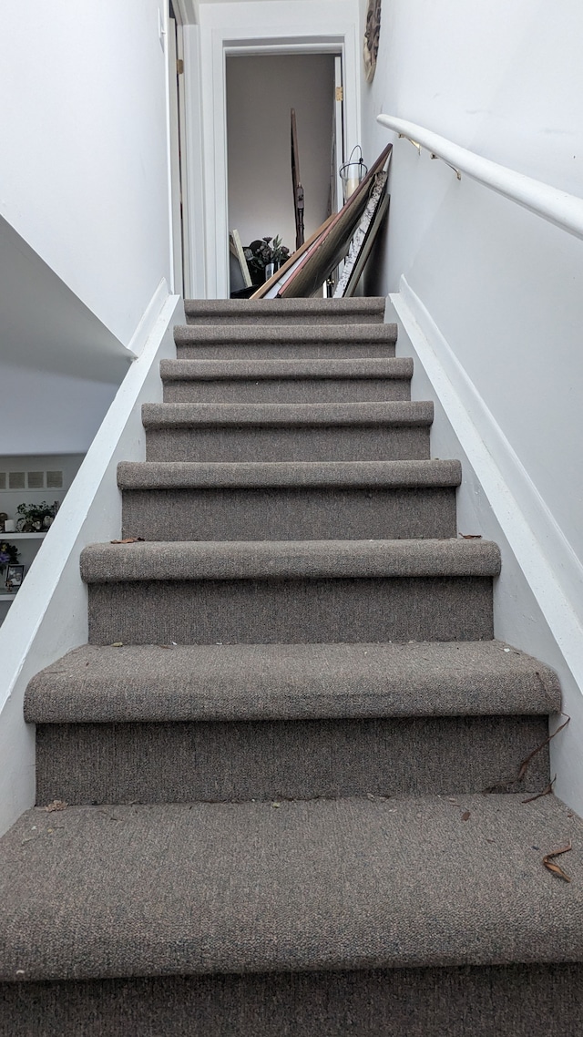 staircase with visible vents