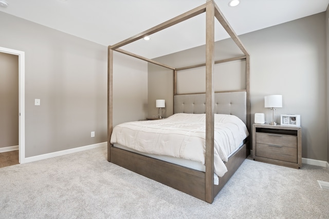 bedroom featuring recessed lighting, baseboards, and carpet floors