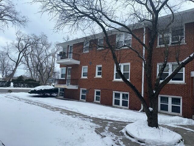 view of snow covered building