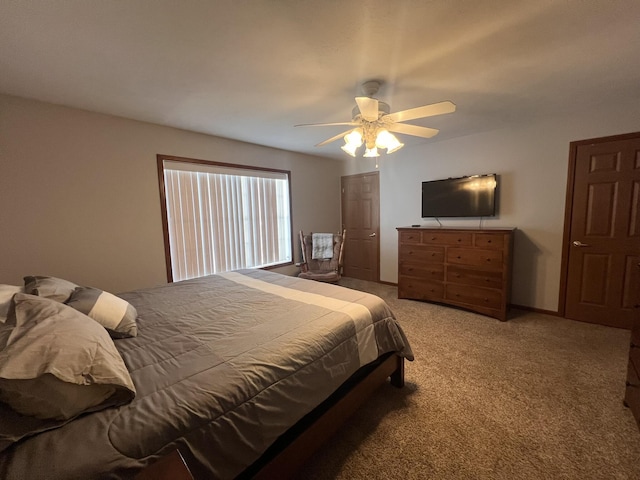 bedroom with carpet floors and a ceiling fan