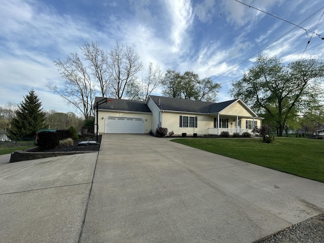 single story home with a garage, a front yard, a porch, and driveway