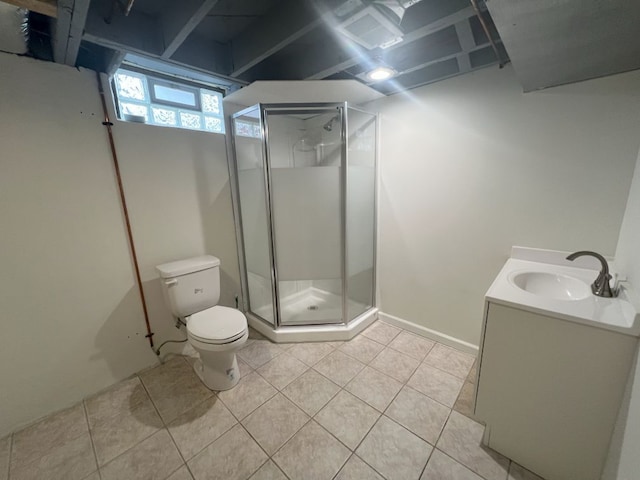 bathroom with tile patterned flooring, a shower stall, toilet, and vanity