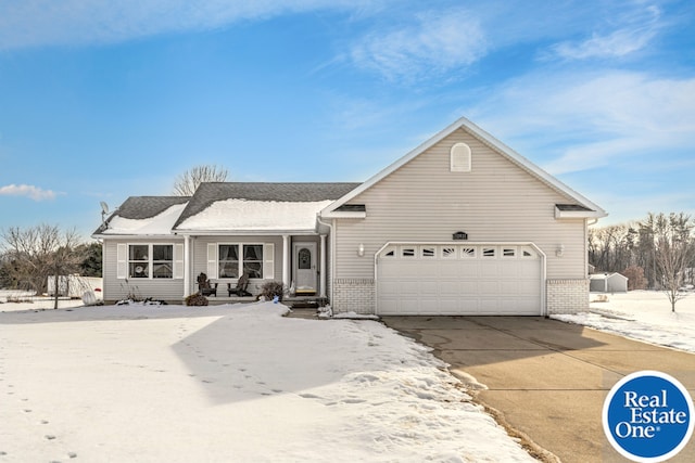 single story home with an attached garage, concrete driveway, and brick siding