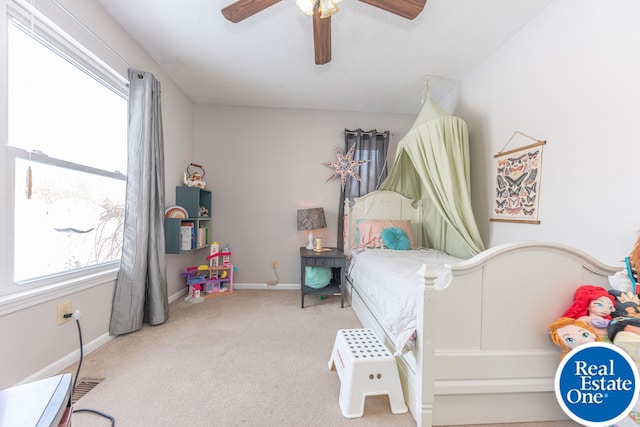 bedroom with ceiling fan, carpet floors, and baseboards