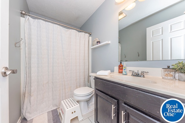 full bathroom with a textured ceiling, tile patterned flooring, toilet, vanity, and a shower with curtain