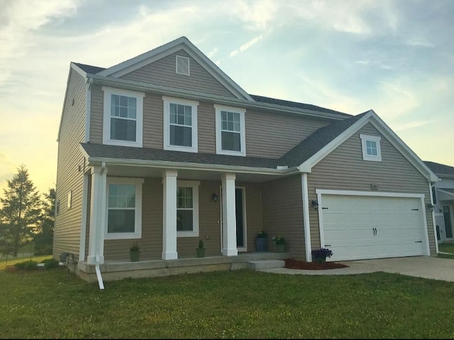 view of front of property featuring concrete driveway, a porch, a front lawn, and an attached garage