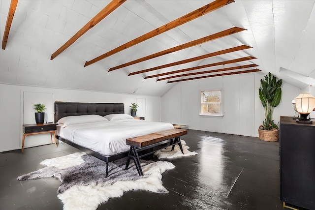 bedroom with lofted ceiling with beams