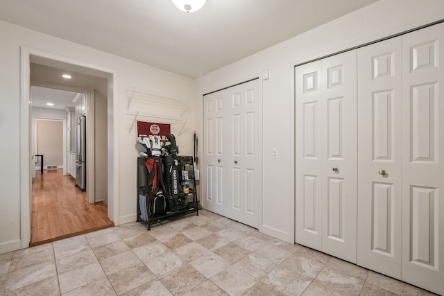 interior space with visible vents and baseboards