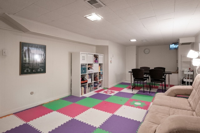 playroom with baseboards and visible vents