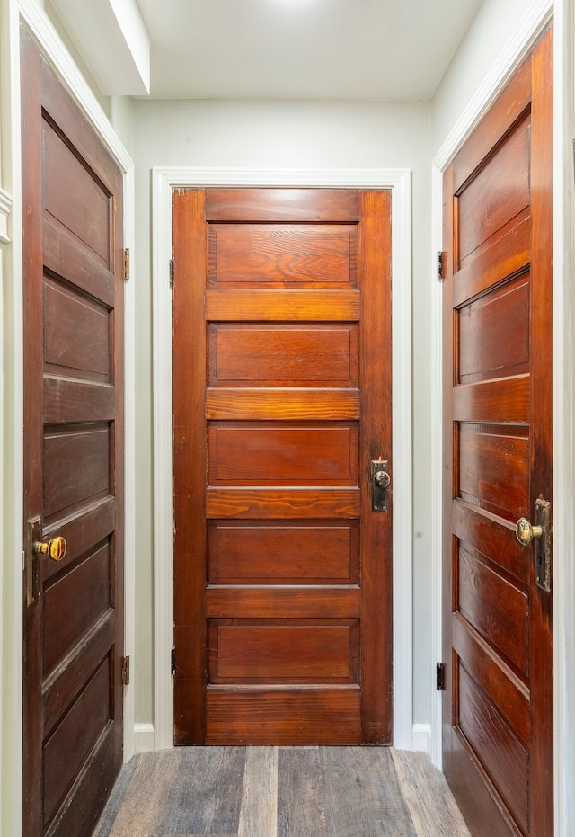 doorway to outside featuring wood finished floors