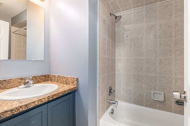 bathroom featuring vanity and bathing tub / shower combination