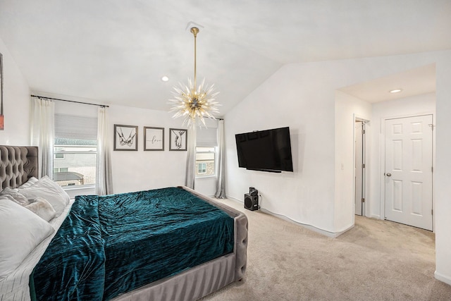 carpeted bedroom with lofted ceiling, baseboards, and a notable chandelier