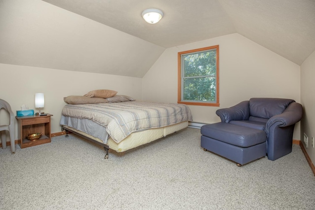 bedroom with carpet floors, baseboards, and lofted ceiling