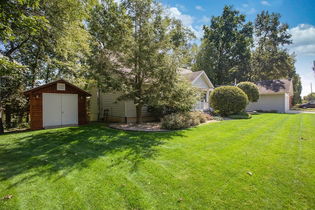 view of yard with a shed and an outdoor structure