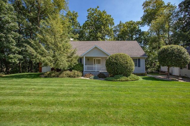 view of front of home featuring a porch and a front lawn