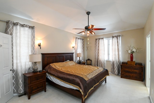 bedroom featuring ceiling fan and light colored carpet