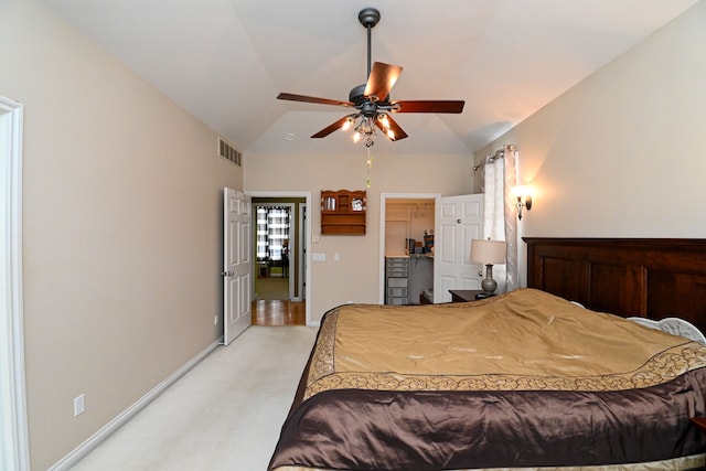 bedroom featuring lofted ceiling, visible vents, light carpet, and baseboards