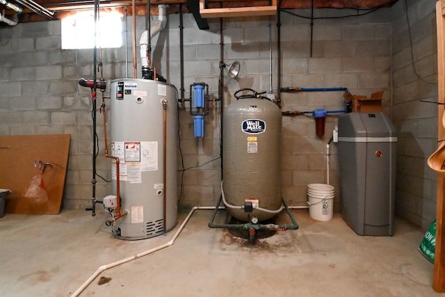 utility room featuring gas water heater