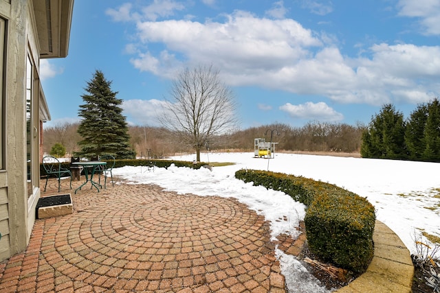 view of snow covered patio