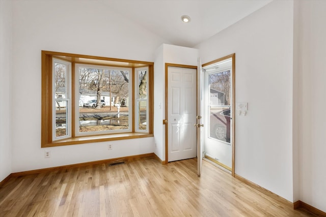 unfurnished bedroom with baseboards, recessed lighting, visible vents, and light wood-style floors