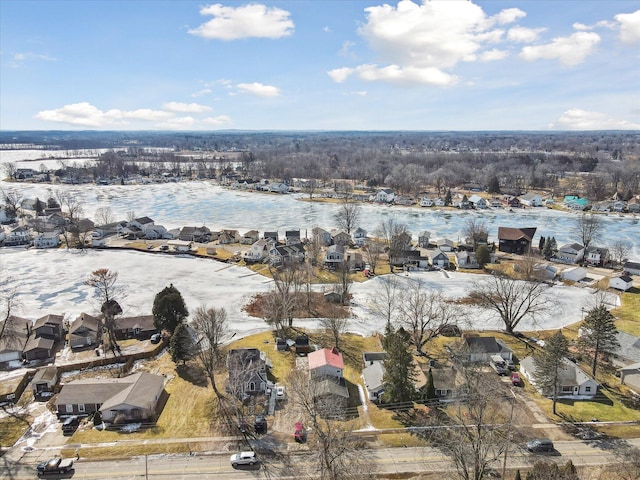 birds eye view of property with a residential view