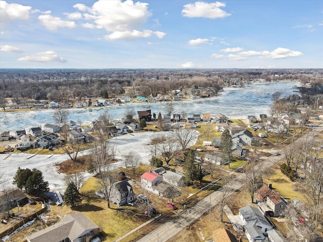 aerial view featuring a residential view and a water view