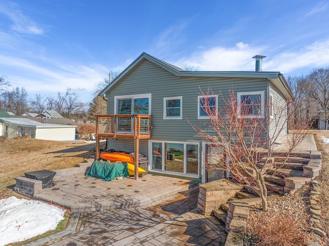 back of house featuring a patio area