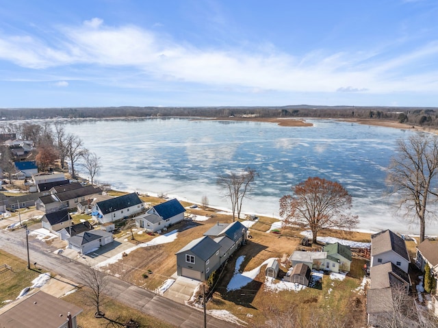 birds eye view of property featuring a water view and a residential view