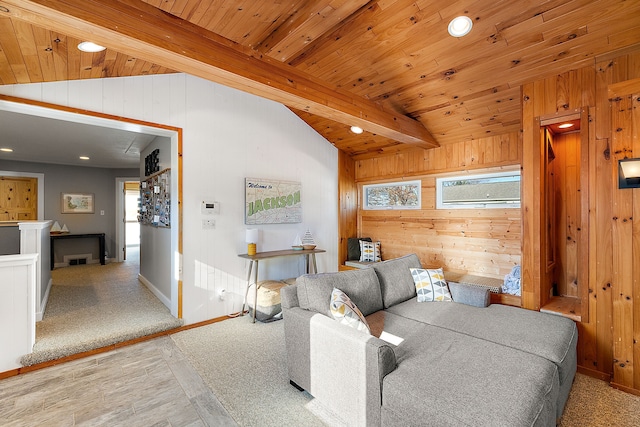 living room featuring vaulted ceiling with beams, wood walls, and wooden ceiling