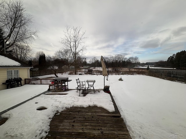 view of yard covered in snow