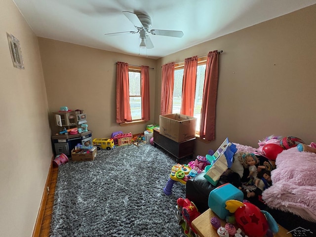 recreation room featuring a ceiling fan