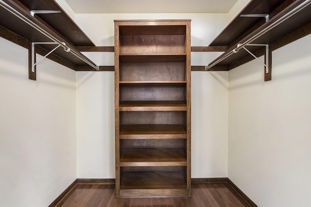 spacious closet with wood finished floors