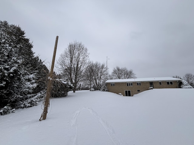 view of snowy yard