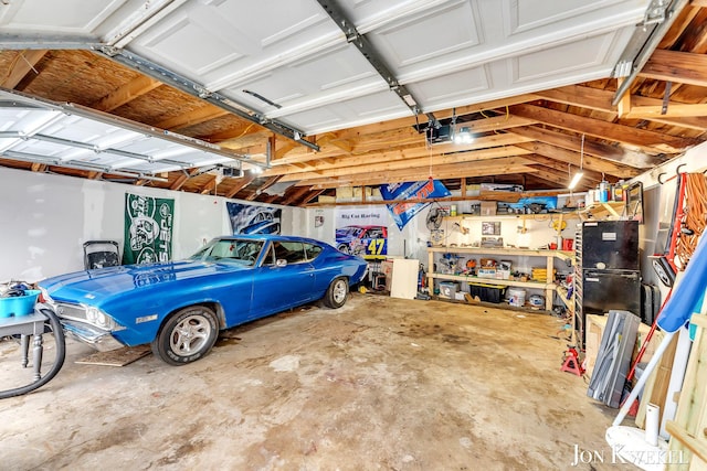 garage featuring a garage door opener