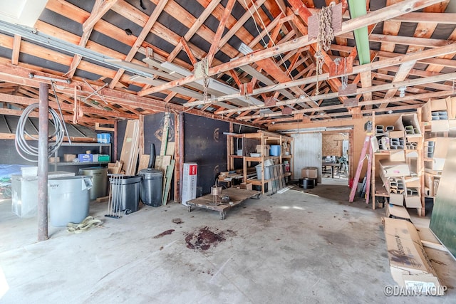 interior space featuring unfinished concrete floors