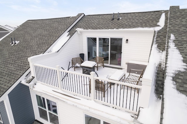 view of snow covered deck