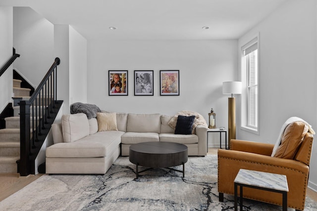 living room with recessed lighting and stairs