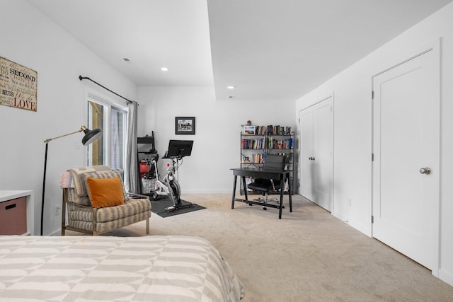 bedroom featuring recessed lighting, baseboards, and light colored carpet