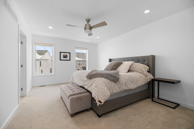 bedroom featuring light carpet, baseboards, visible vents, and recessed lighting