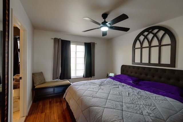 bedroom featuring a ceiling fan and wood finished floors