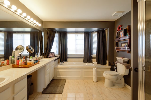 bathroom featuring double vanity, visible vents, toilet, tile patterned flooring, and a bath