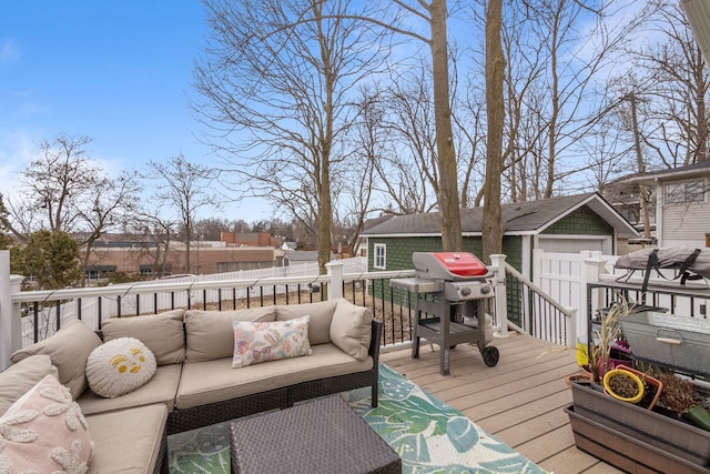 wooden terrace with an outdoor structure, area for grilling, and an outdoor hangout area