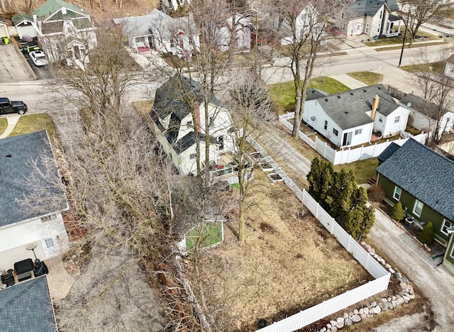 birds eye view of property with a residential view