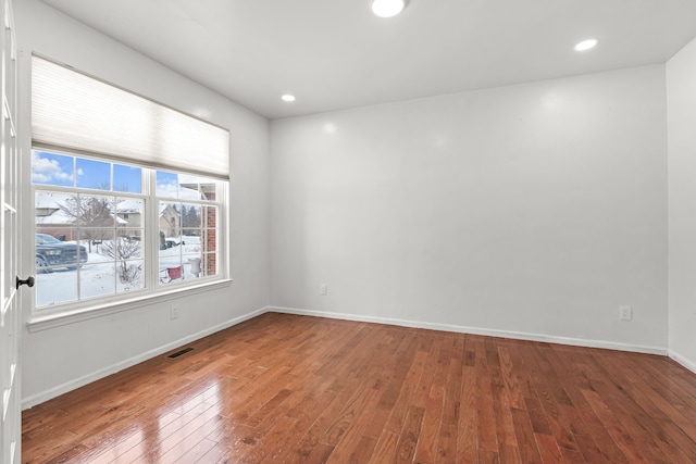 35316 Burgundy, Sterling Heights, MI 48312 - empty room with baseboards, visible vents, hardwood / wood-style floors, and recessed lighting