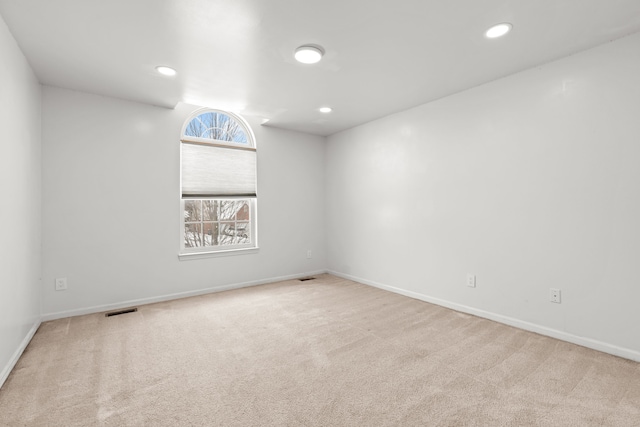 35316 Burgundy, Sterling Heights, MI 48312 - empty room featuring light carpet, baseboards, visible vents, and recessed lighting