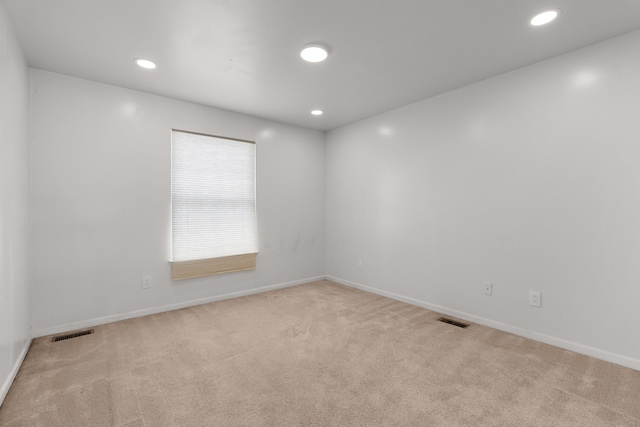 35316 Burgundy, Sterling Heights, MI 48312 - empty room with recessed lighting, visible vents, baseboards, and light colored carpet